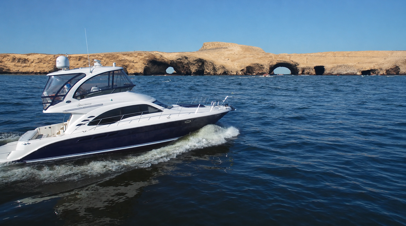 Private yacht on blue water in Paracas